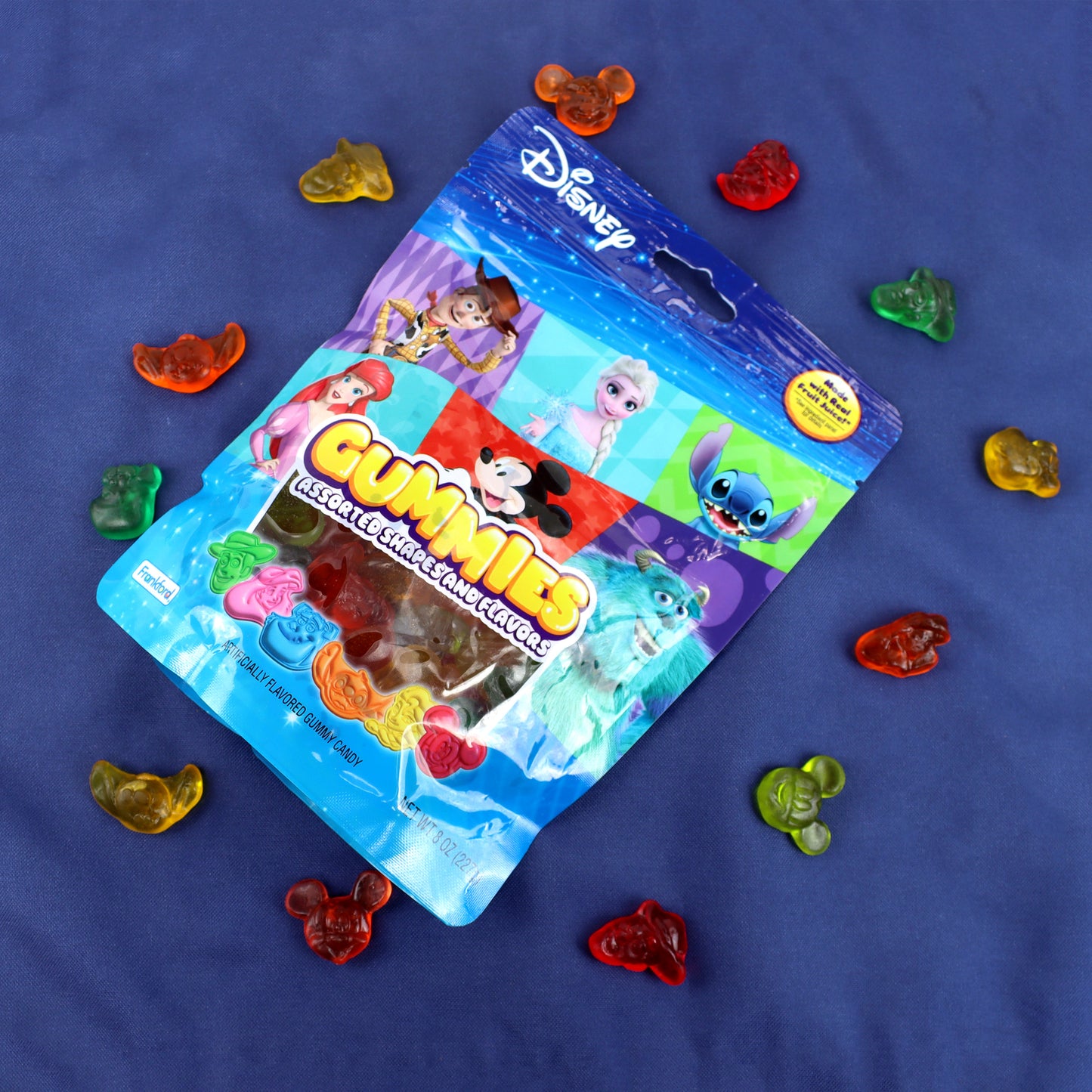 Disney gummies bag with individual gummies circled around the bag 