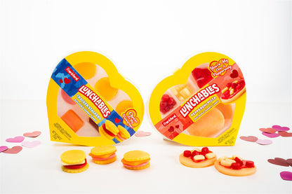 Heart shaped cracker stacker and pepperoni pizza boxes with individual gummies 