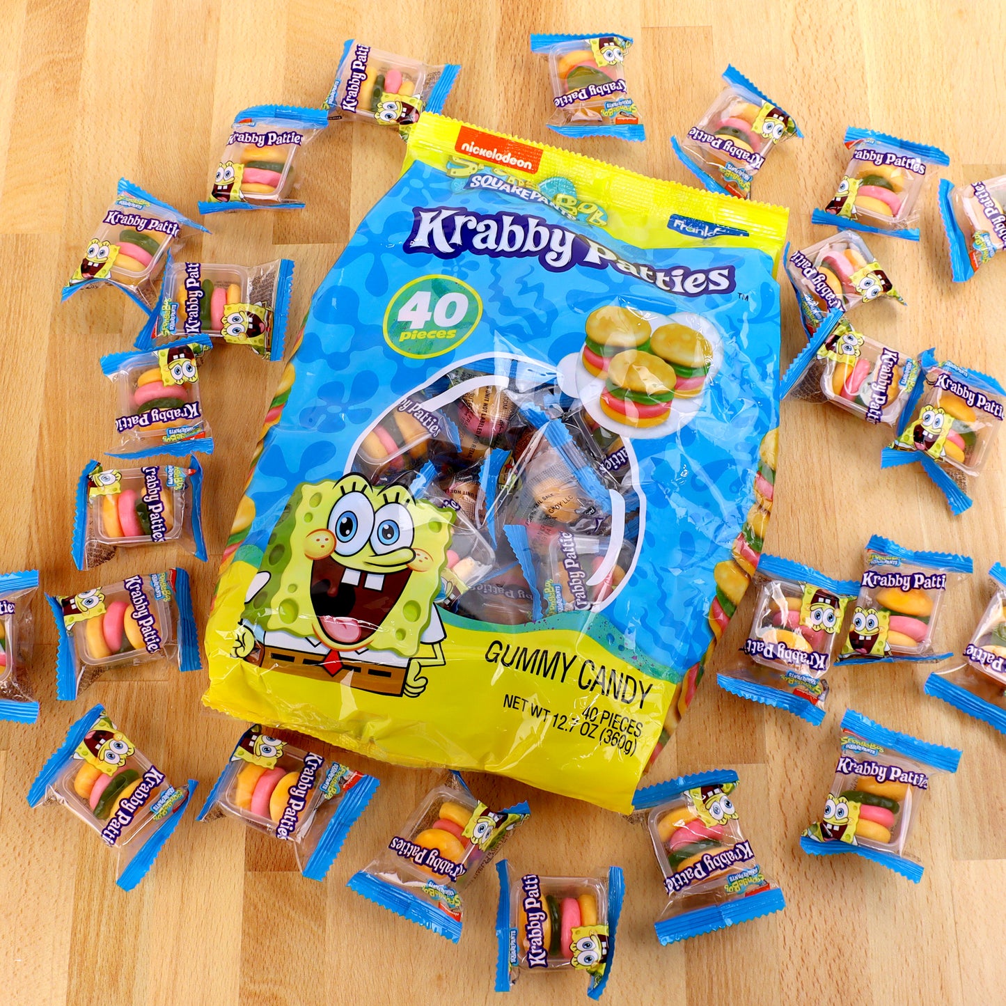 Bag of Krabby Patties surrounded by individual wrapped Krabby Patties 