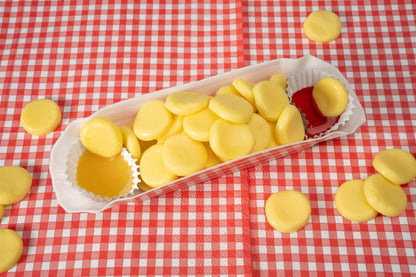 Gummies and dipping sauces in plastic tray 