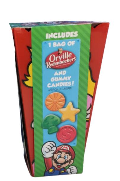 side of gift set detailing contents of container(1 bag of orville redenbacher's unpopped popcorn and gummy candies in mario shapes_