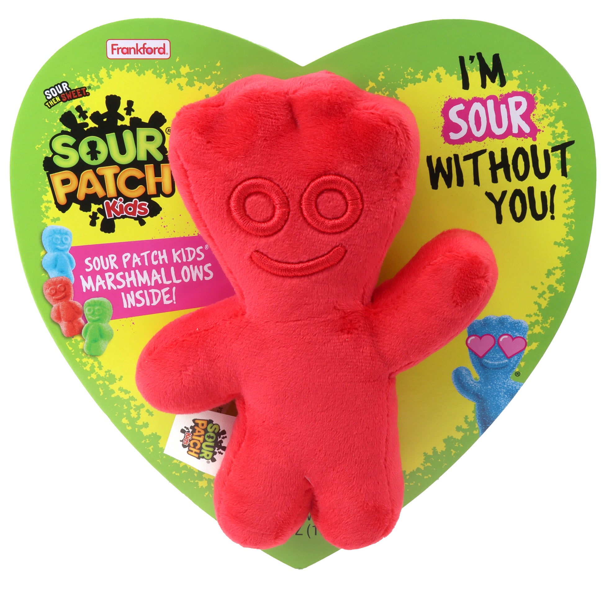 yellow heart shaped box with a green border and a red sour patch plush toy on the front