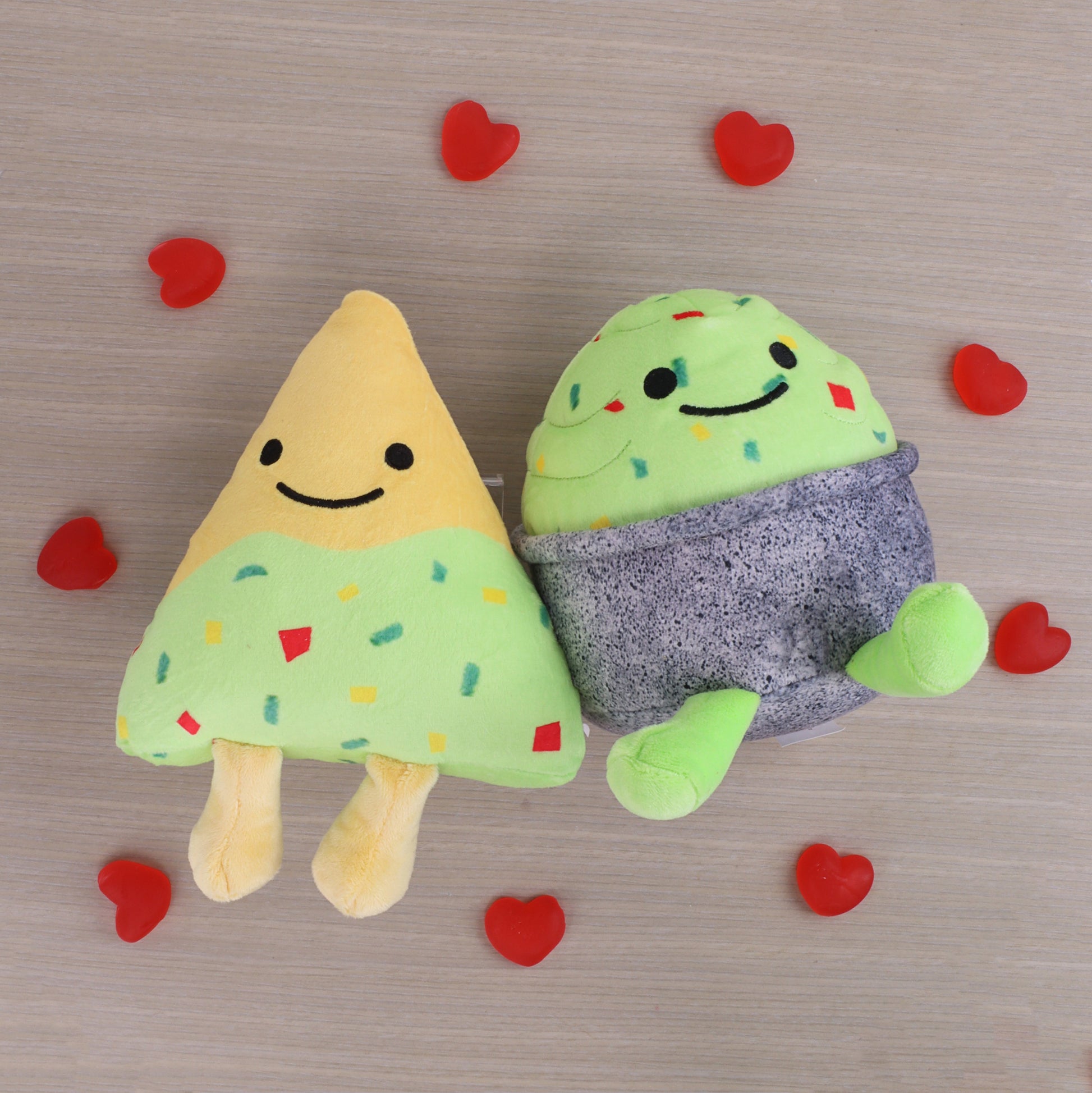 chips and guac plush and gummy heart box surrounded by individual unwrapped gummy hearts 