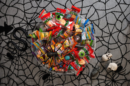 Individually wrapped gummy body parts in a bowl with other gummies(krabby patty gummies not included with gummy body parts)