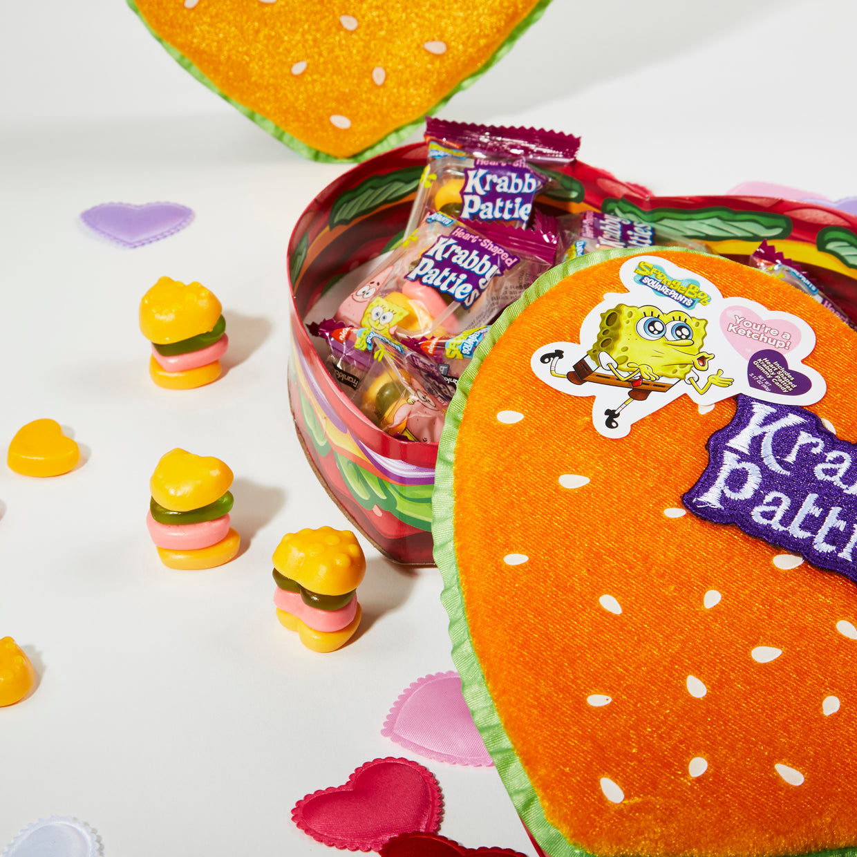 opened plush heart shaped box with unopened krabby patties gummies and opened heart shaped krabby patties gummies